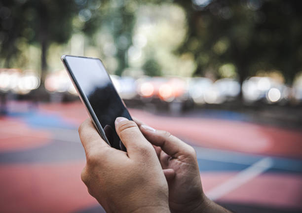 istock Male Hands with Smart Phone 1331809169