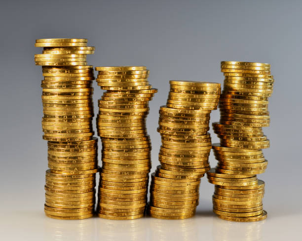 istock Four stacks of golden coins. 1331809360