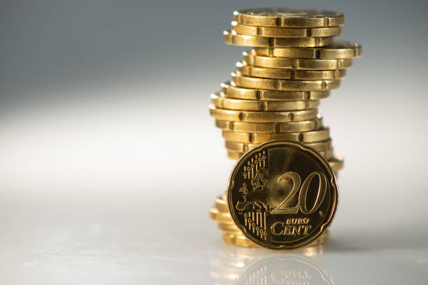 istock Coin Twenty Euro Cents and a Stack of Coins. 1331809401