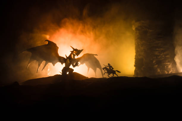 istock Battle between dragon and heroic soldiers. Creative table decoration. Selective focus 1331811266