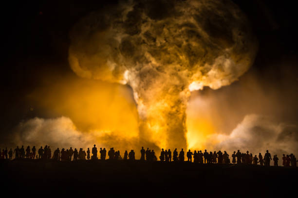Nuclear war concept. Explosion of nuclear bomb. Creative artwork decoration in dark.