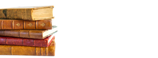 istock Stack of old books on white background banner 1331811442