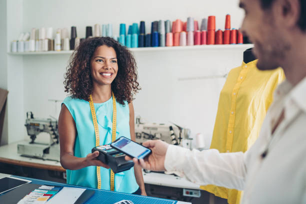 istock Mobile payment in the fashion studio 1331816404