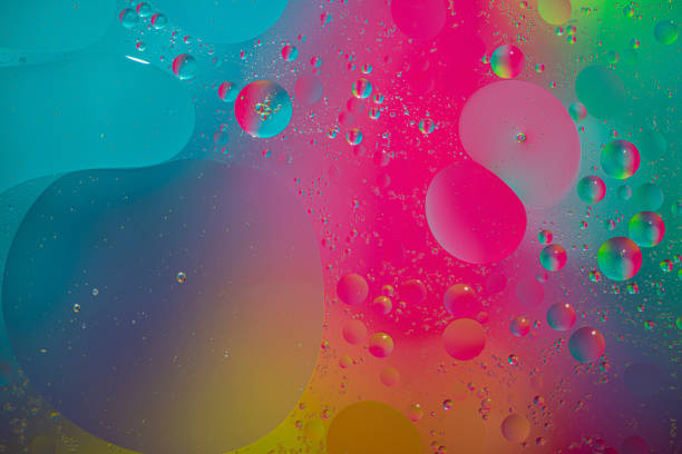 istock Close up image of mixed oil with water 1331818634