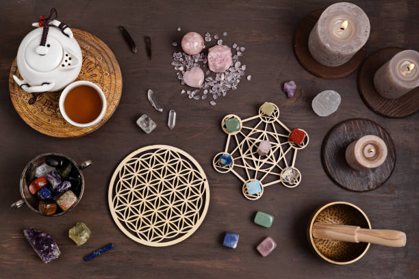 istock Healing chakra crystal grid therapy. Rituals with gemstones and aromatherapy for wellness, healing, meditation 1331819060