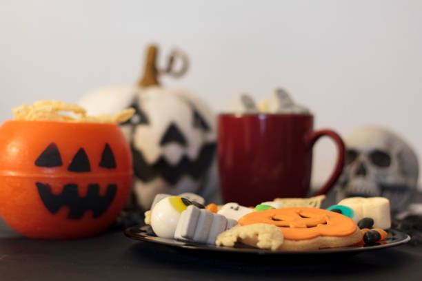 istock Halloween table with assorted fun and spooky treats 1331821855