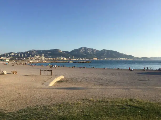 Photo of The Prado Beach is the largest beach in Marseille and is more like a succession of beaches over miles between the David beach and the Vieille Chapelle beach. The Marseilleveyre massif can be seen in the background.