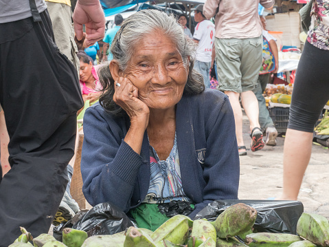Iquitos, Peru- Mar 27, 2018: Portrait of a woman  selling  bananas on the Belen market, Amazon jungle. South America. Amazonia.