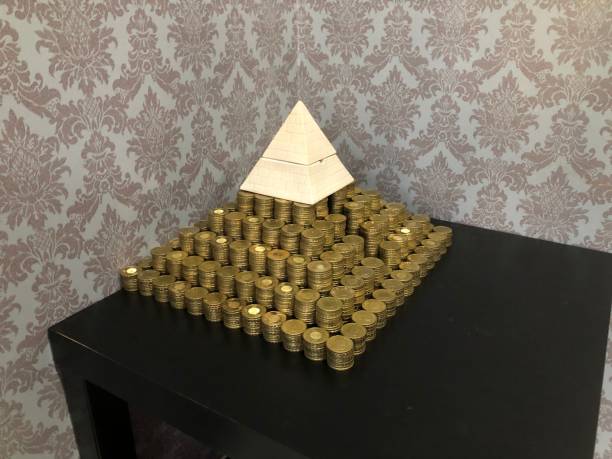 Taiwan coins pyramid-shaped pile of Taiwan coins gold ira guide stock pictures, royalty-free photos & images