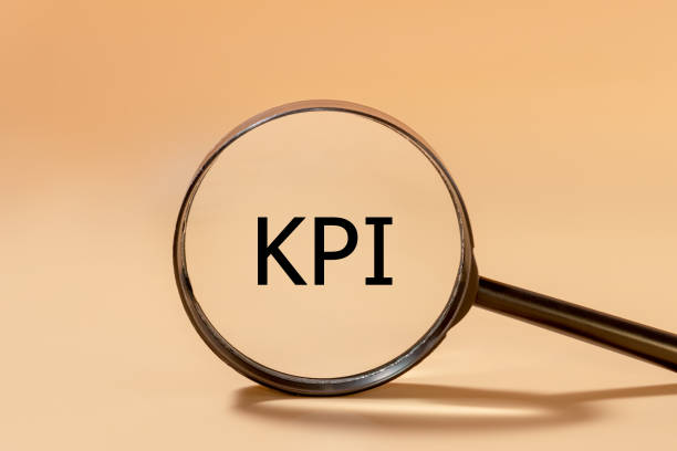 istock KPI inscription in black letters on a magnifying glass. Key performance indicator concept. 1331829460