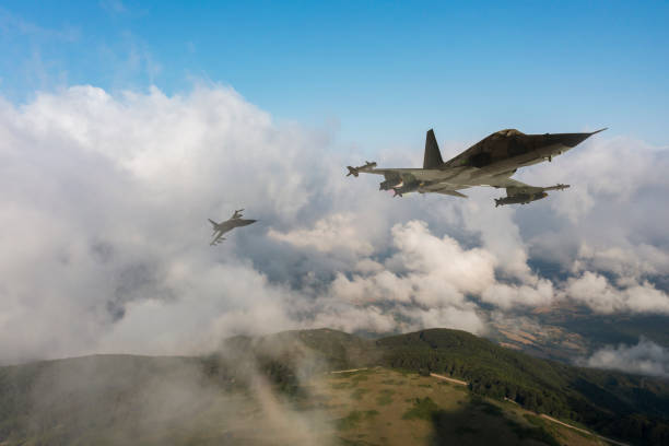 istock Jet fighters flying over the clouds. 1331829728