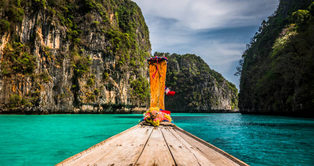 istock POV: Longtail boat sailing through tropical lagoon in Thailand 1331830411