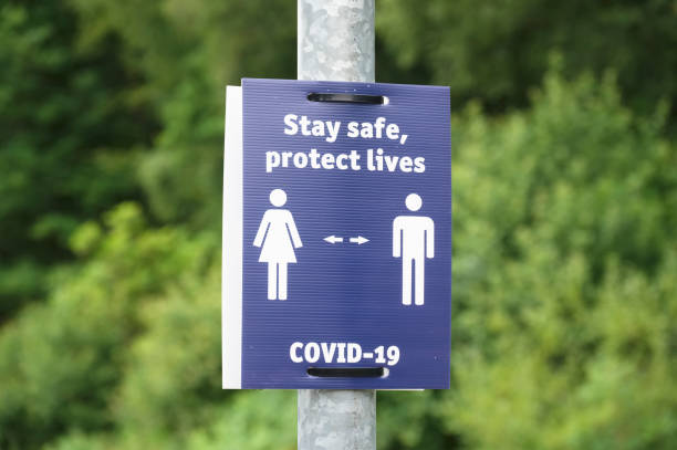 istock Social distancing sign at train station to stay safe 1331832690