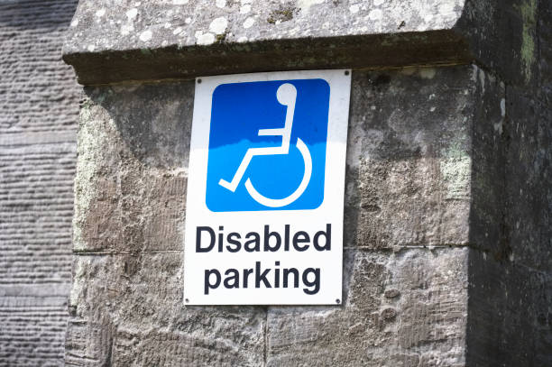 istock Disabled blue badge holder parking sign for driver 1331834796