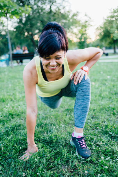 istock Smiling Woman Doing Stretching Exercises 1331837160