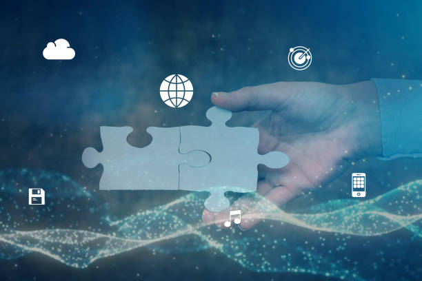 istock Hand Holding Jigsaw Puzzle Piece Unlocking New Futuristic Technologies. Palm Carrying Puzzles Part Displaying Solving Late Innovative Virtual Ideas. 1331838963