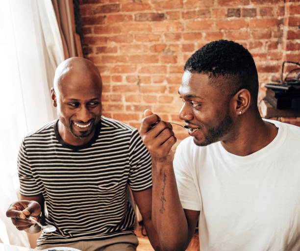 istock Gay couple doing breakfast together 1331839662