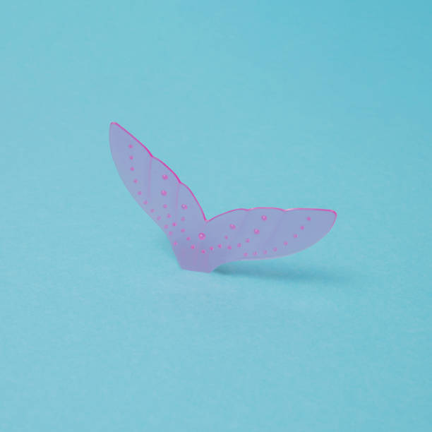 istock Mermaid tail with  bubbles on blue background. Minimal design. 1331840001