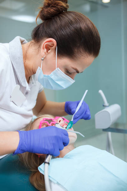 istock Little Girl at dentists office 1331841693