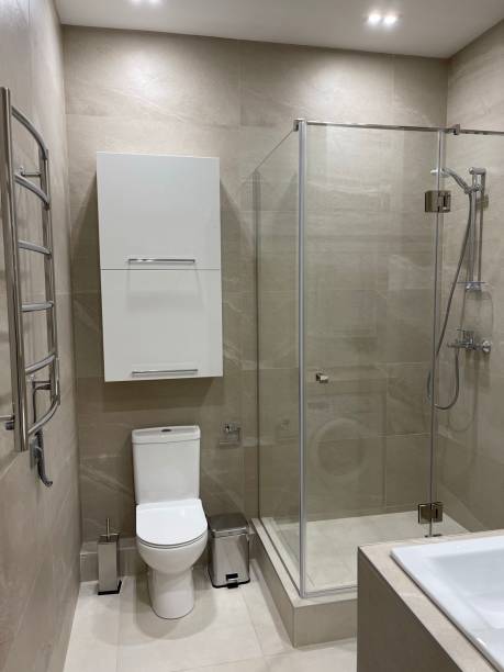 istock bright bathroom with toilet and shower 1331842954