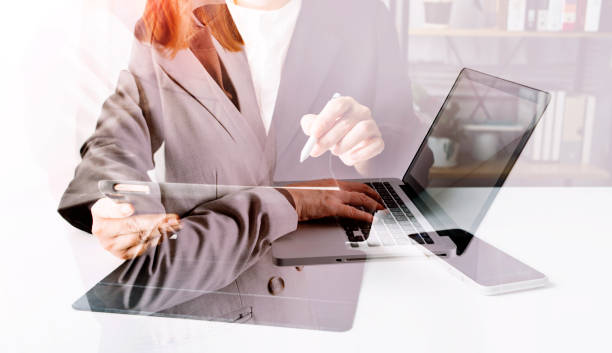 istock Business people using tablets And using his finger to touch the screen With a business graph showing up in a virtual screen.New startup ideas and business growth concept. 1331844763
