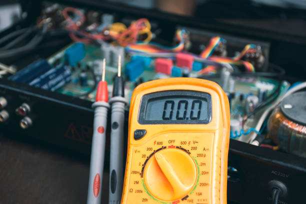 Digital multimeter for checking voltage Digital multimeter for checking voltage and electronics part inspection of electrical appliances electrician multimeter stock pictures, royalty-free photos & images