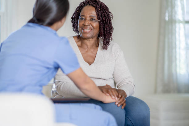 istock Nurse offering emotional support during home visit 1331856625