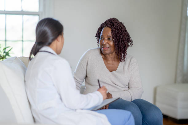 istock Doctor conducts home visit 1331856645