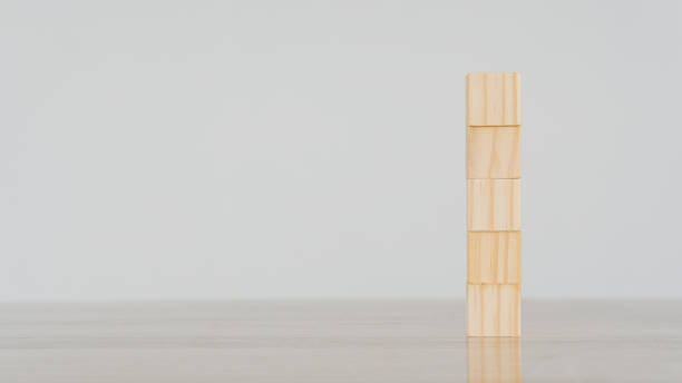 istock The wooden blocks are stacked like towers and can include any text. 1331859814