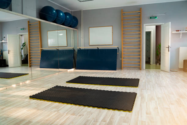 istock Empty Gymnastics gym with two mats on the flour 1331863710