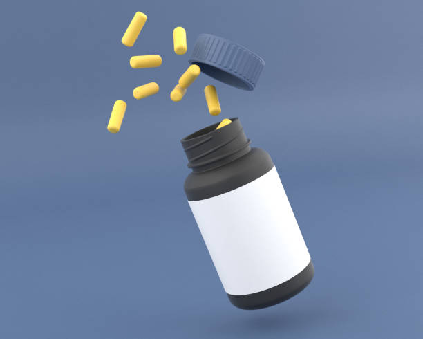 istock Pills spilling out of colorful bottle 1331875111