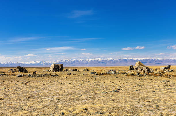 Tarkhatinsky megalithic complex consists of stone blocks. It is archaeological monument in Altai Republic