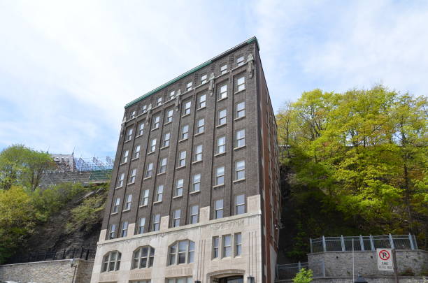 istock tall grey masonry building in Quebec Canada 1331883566