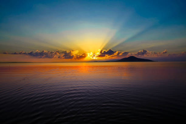 Sunset river sky clouds landscape. River sunset horizon view. Sunset river landscape. River sunset view