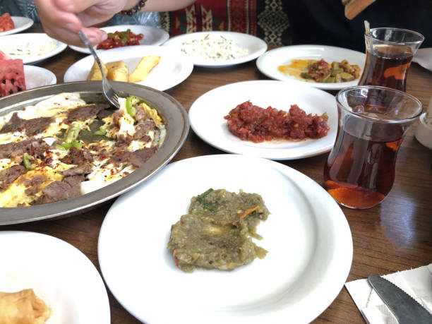 istock Lots of plates with food on a table 1331892472