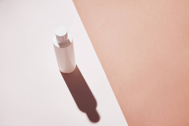 istock Natural cosmetic product. White bottle on pastel background 1331896388
