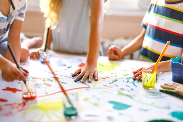 istock Children painting whit watercolors 1331898708