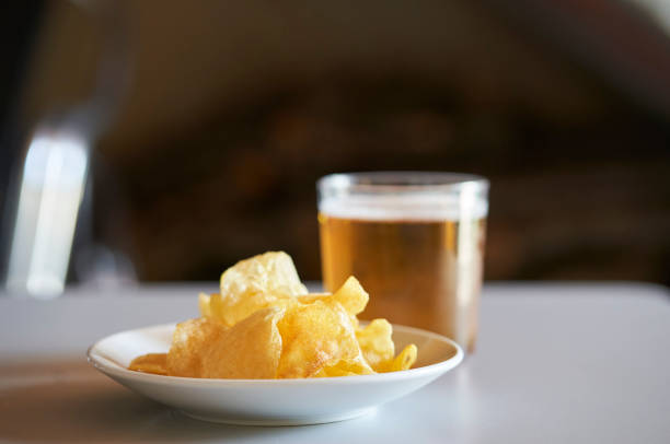 Fried potato appetiser and cold beer stock photo