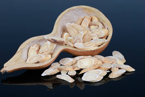 istock Chinese herbal medicine astragalus membranaceus on a white backg 1331902564