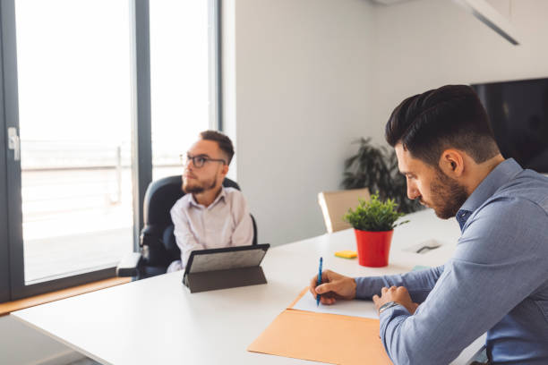 istock Professionals working together, collaborating in a corporate office 1331904281