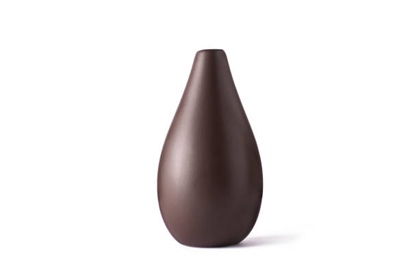 istock Ceramic vase of brown color on a white isolated background. 1331905896