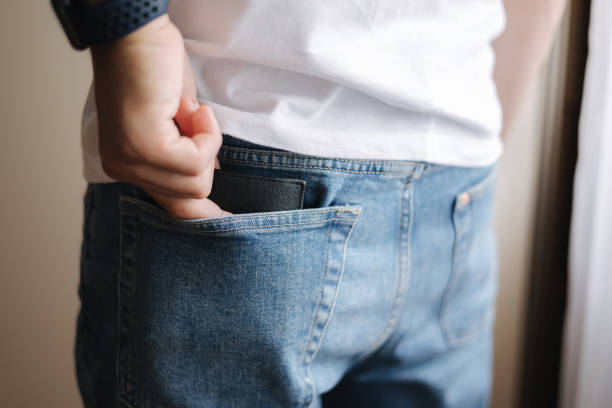 istock Back view of man taking wallet from back pocket 1331911134