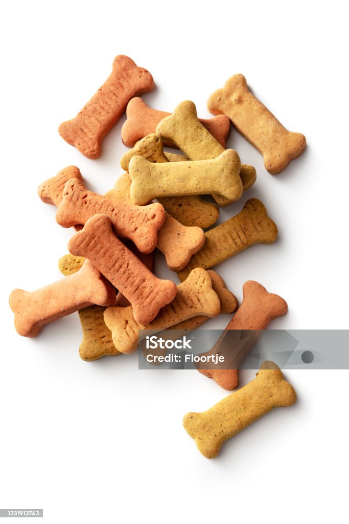 Pets: Bone Shaped Dog Biscuits Isolated on White Background Bone Shaped Dog Biscuits Isolated on White Background. More pet supplies and food ingredients can be found in my portfolio. Please have a look Dog Biscuit Stock Photo