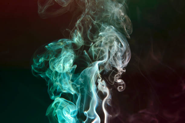 istock colorful smoke on dark background 1331914792