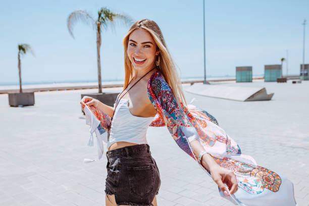 istock Young beautiful blond woman smiling outdoors in summertime 1331917539