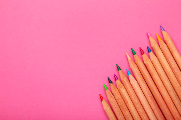 istock Background from color pencils on pink paper with copy space. 1331919738