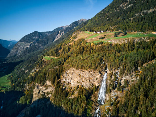 istock beautiful view of a waterfall in the mountains 1331920757