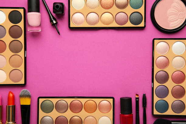 istock Set of decorative cosmetics on pink background with copy space. 1331921015