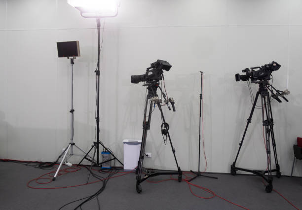 istock TV camera in the press conference room. 1331922576
