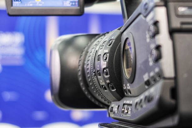 istock TV camera in the press conference room. 1331922658